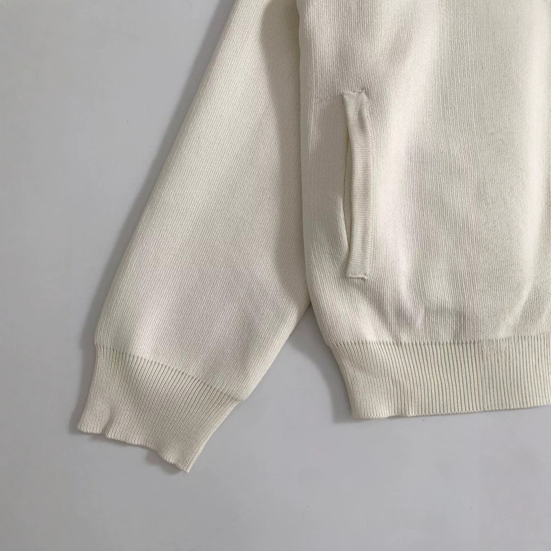 Damen Boxy-Strickjacke mit Stehkragen, Hornoptik-Knopfleiste und Eingrifftaschen Echoarchiv
