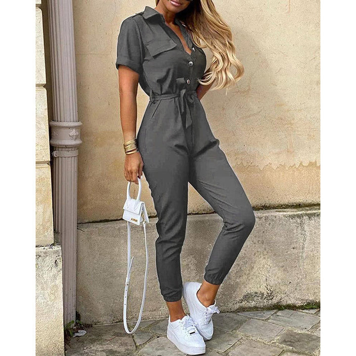 Damen eleganter Jumpsuit mit tailliertem Schnitt und praktischen Taschen Echo Archiv