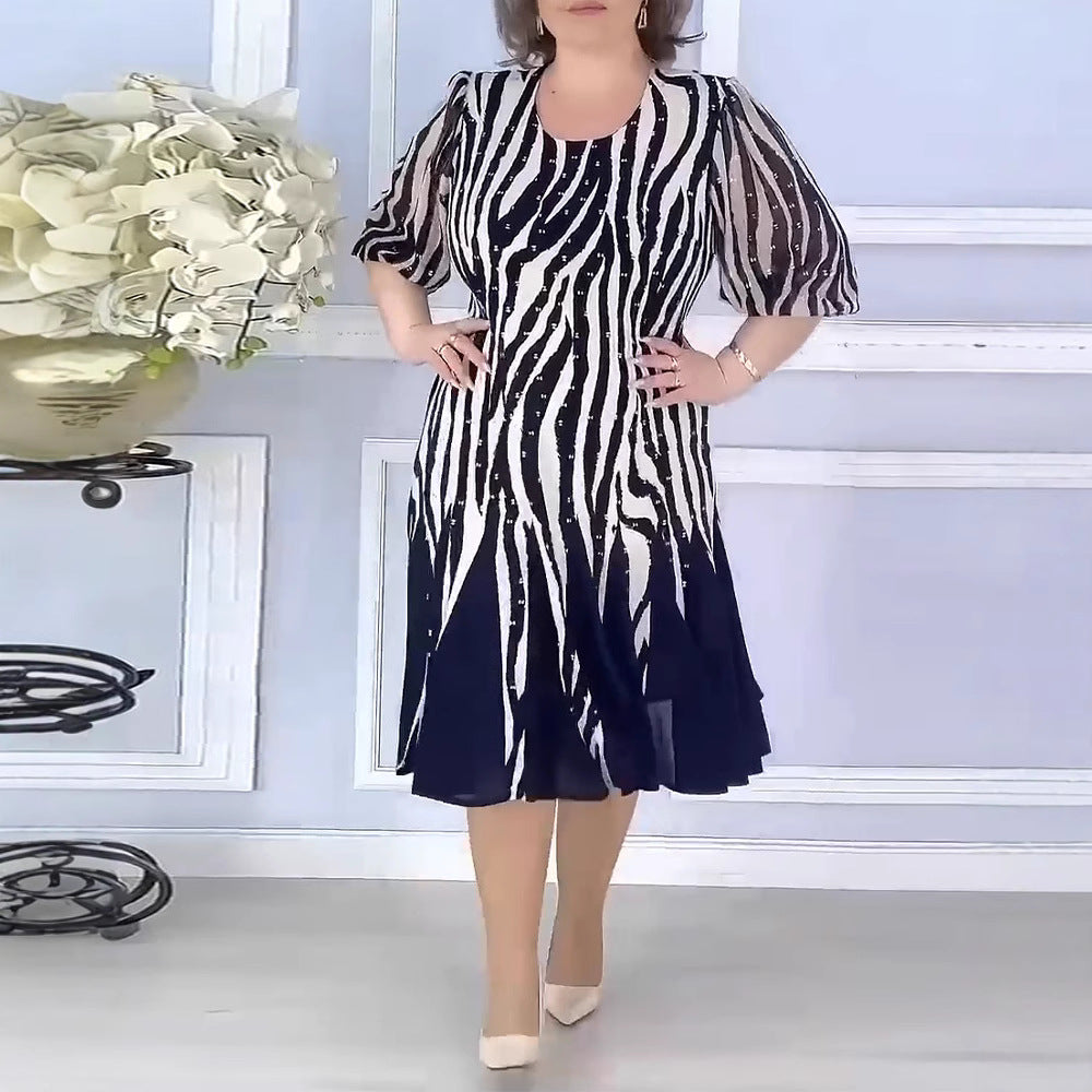 Damen nan tailliertes Midikleid mit grafischem Animalmuster, transparenten Puffärmeln und schwingendem Faltenrock Echo Archiv