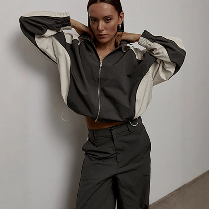 Damen nan sportive Oversize-Trackjacke mit hohem Stehkragen und Raglanärmeln Echo Archiv