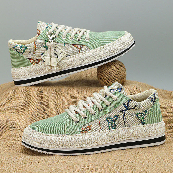 Damen Plateau-Espadrille-Sneaker mit besticktem Canvas, Quastenanhänger und geflochtener Bastsohle – Névara