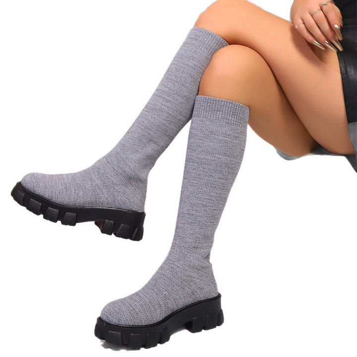 Damen Strick‑Sockstiefel mit hohem Schaft und grober Profilsohle Echoarchiv