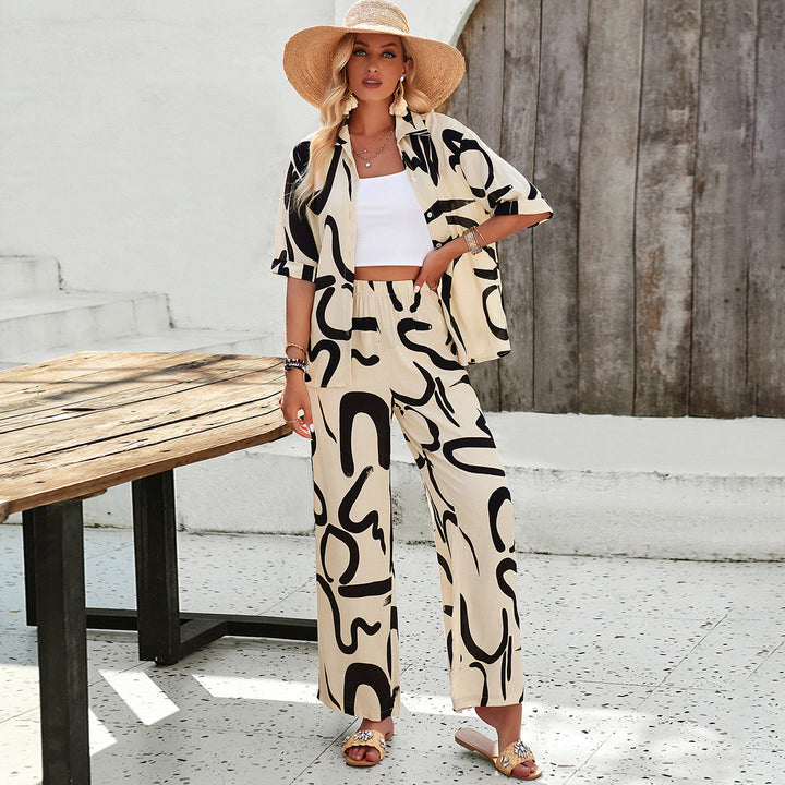 Damen luftiges Zweiteiliges Ensemble mit floralem Muster und weiten Hosen Echo Archiv