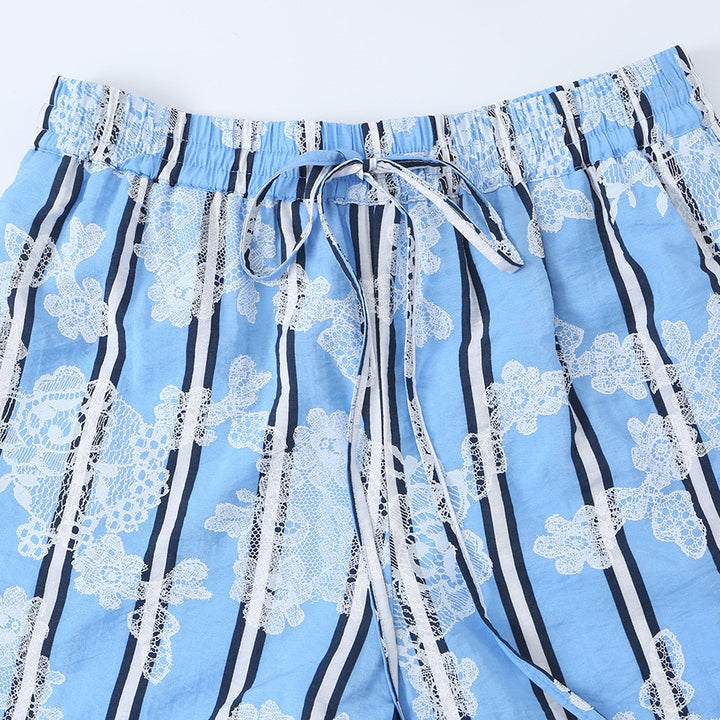 Damen weite Palazzohose mit elastischem Kordelbund und floraler Spitze‑Optik Echo Archiv