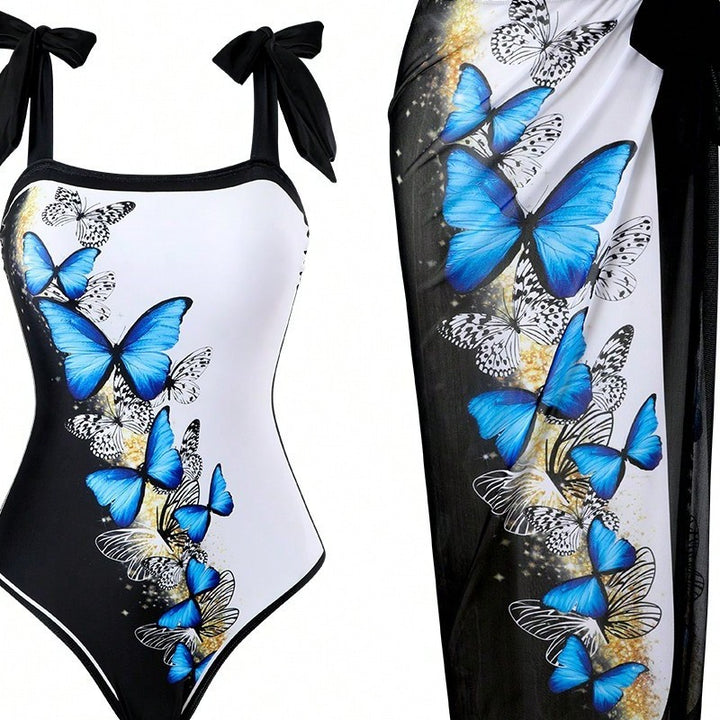 Damen Einteiler Badeanzug mit schickem Wickelrock und Butterfly-Motiv Echo Archiv