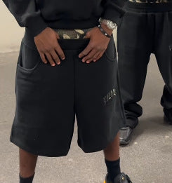 Damen nan hochgeschnittene Jogginghose mit ausgestelltem Bein, elastischem Rüschbund und Leo-Stickdetail Echo Archiv