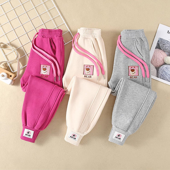 Damen bequeme Sweatpants mit aufgesticktem Motiv und elastischem Bund Echo Archiv