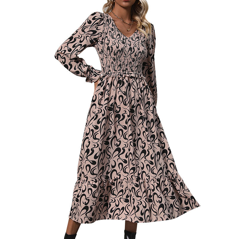 Damen Midikleid mit elastischem Smock-Oberteil, abstraktem Allover‑Print und ausgestelltem Volant‑Saum – Élara
