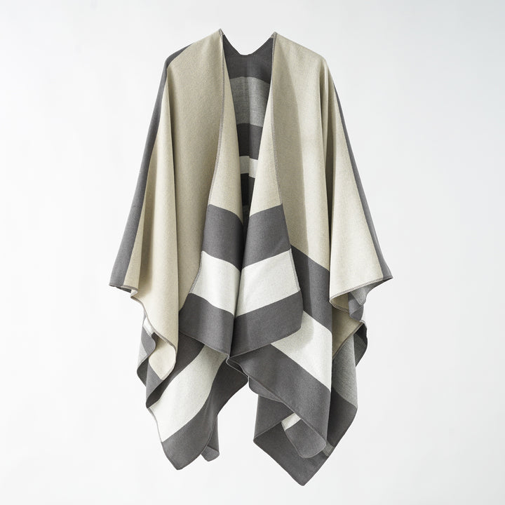 Damen Oversize-Ruana im Cape‑Stil aus Wolloptik mit geometrischen Blockstreifen Echo Archiv
