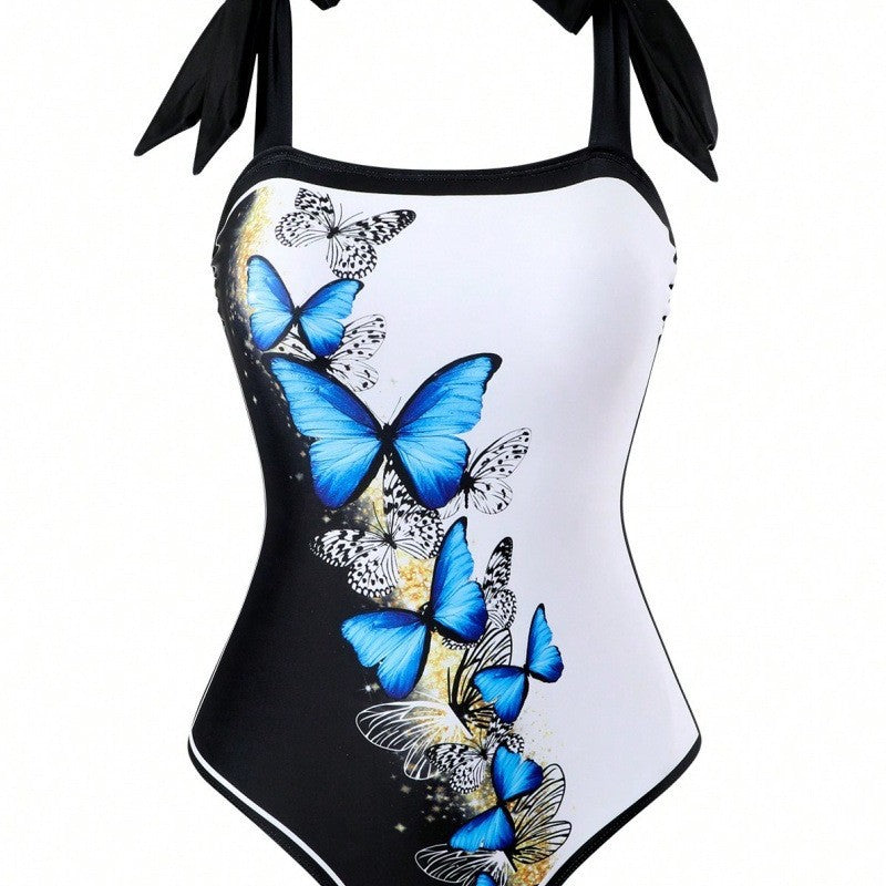 Damen Einteiler Badeanzug mit schickem Wickelrock und Butterfly-Motiv Echo Archiv