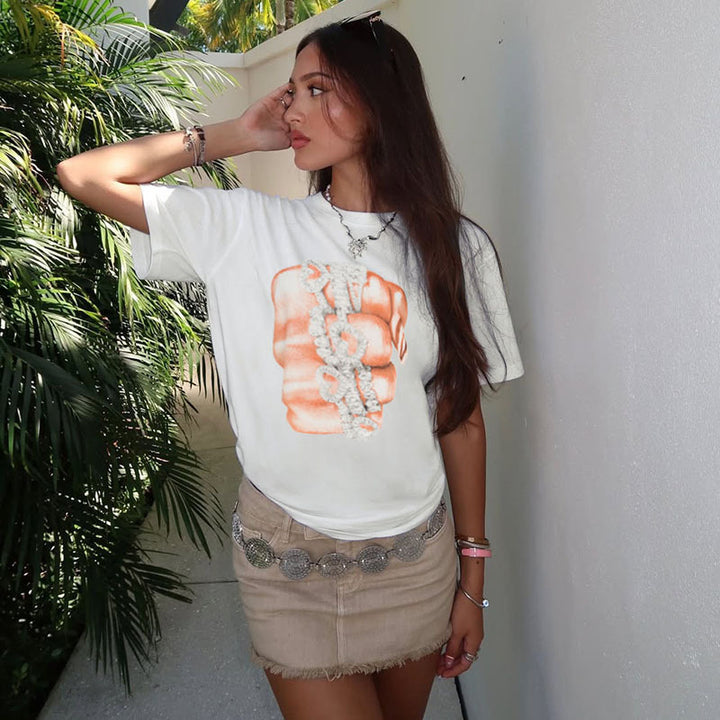 Damen lässiges T-Shirt mit glänzendem Kreuzdesign und großzügigem Ausschnitt Echo Archiv