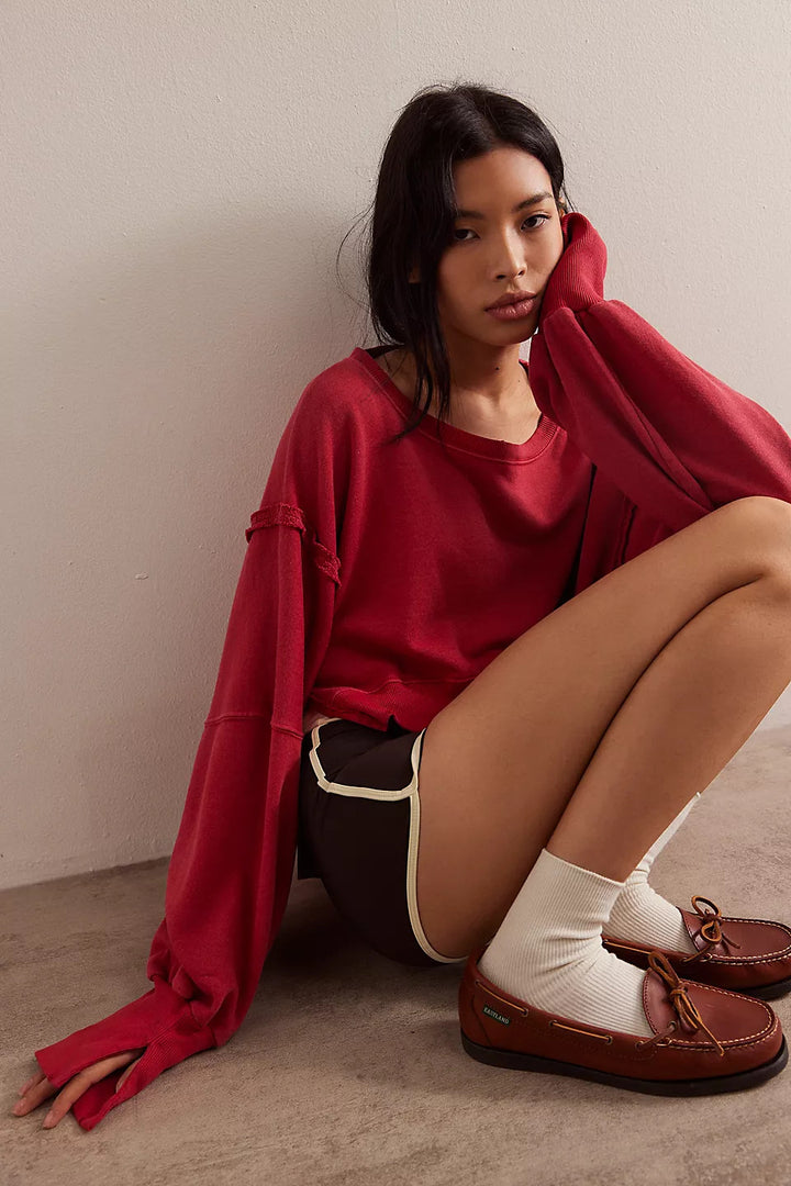 Damen cropped Oversize-Sweatshirt mit Daumenloch, fransigem Saum und weitem Raglanärmel – Avérine