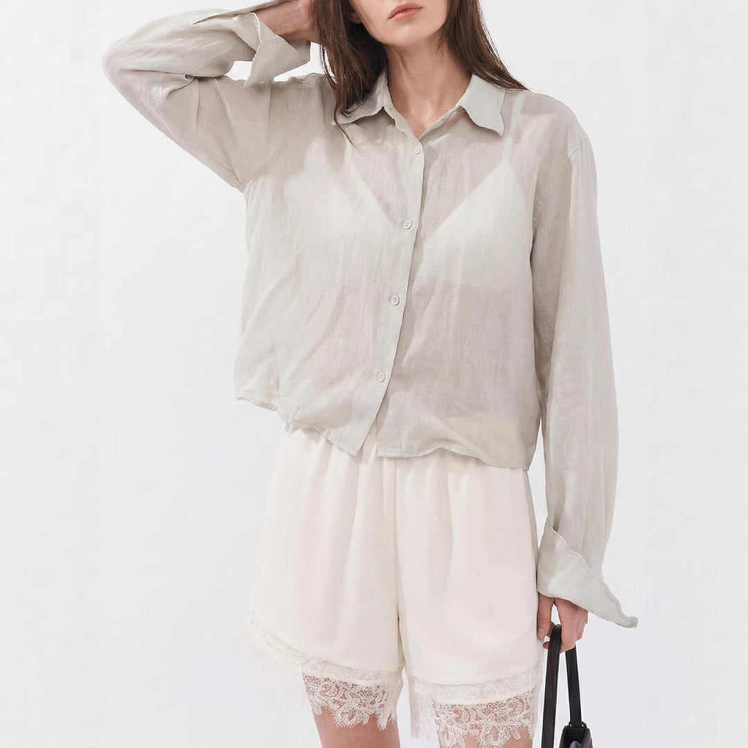 Damen Elegante und leichte Bluse mit Knopfdetails Echo Archiv