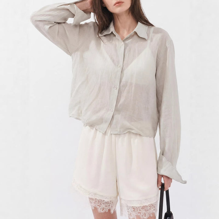 Damen Elegante und leichte Bluse mit Knopfdetails Echo Archiv