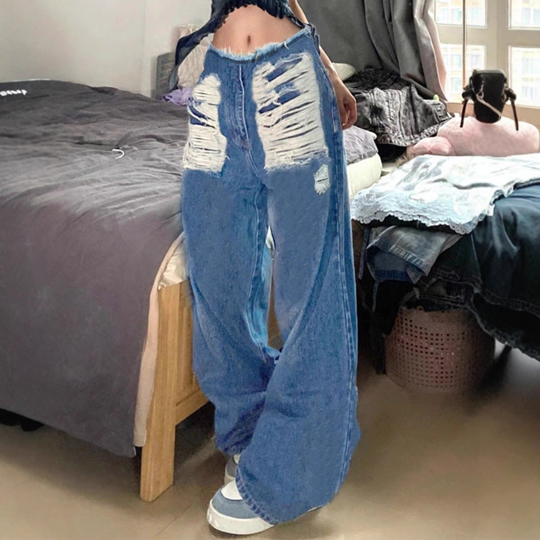Damen hochgeschnittene weite Jeanshose aus Denim mit stark zerstörter Front und rohem Bund Echo Archiv