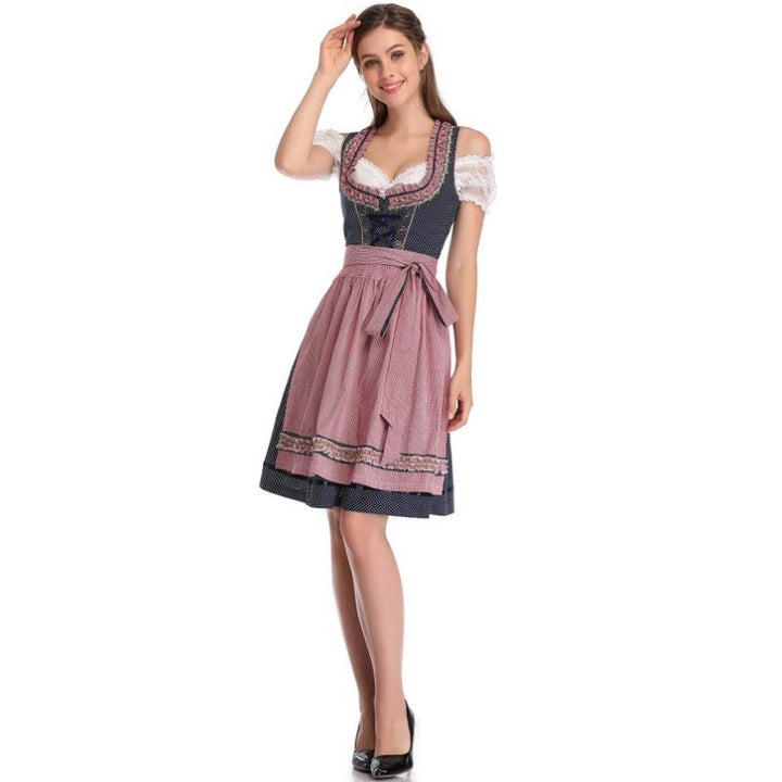 Damen nan traditionelles Dirndlkleid mit Herzausschnitt, korsettähnlicher Schnürung und kariertem Schürzenrock Echo Archiv