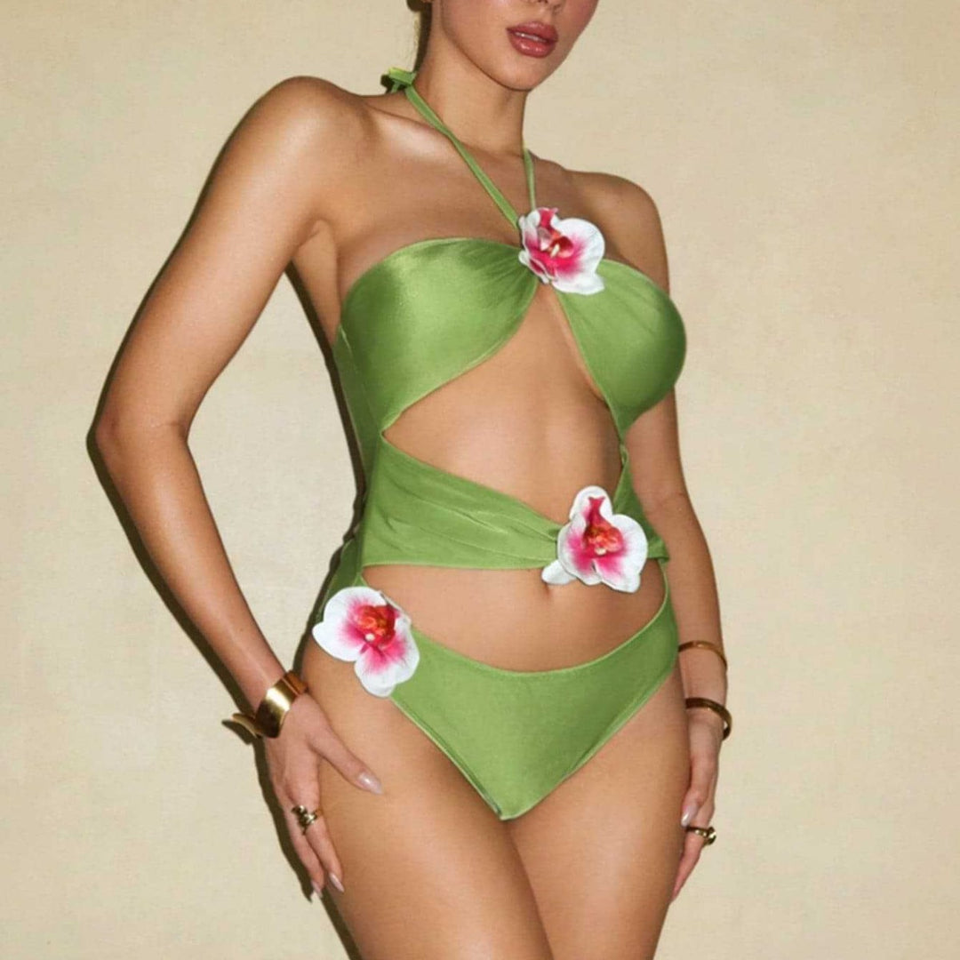 Damen Einteiliger Badeanzug mit floralen Akzenten und verspieltem Cut-Out Echo Archiv