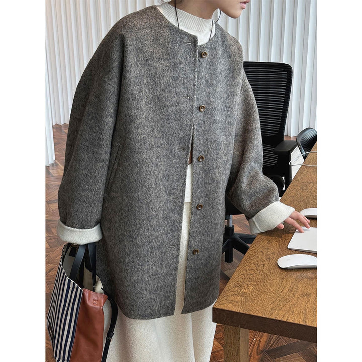 Damen Oversized Wollmix-Mantel mit Knopfleiste und umschlagbaren Teddy-Bündchen Echoarchiv
