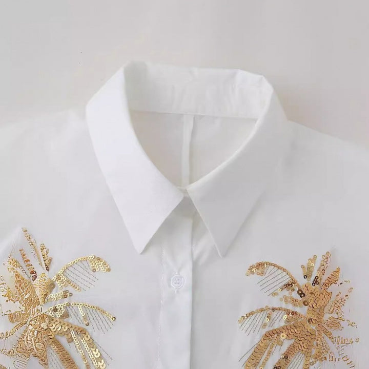 Damen Oversize-Hemdbluse mit Palm-Motiv aus goldenen Pailletten Echo Archiv