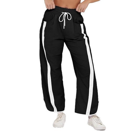 Damen relaxte Trackpants mit seitlichem Kontraststreifen, elastischem Smokbund und Eingrifftaschen – Avélisse
