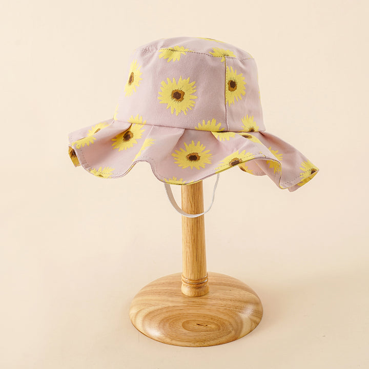 Damen Sonnenhut mit breiter Rüschenkrempe und Sonnenblumen‑Print – Avérine