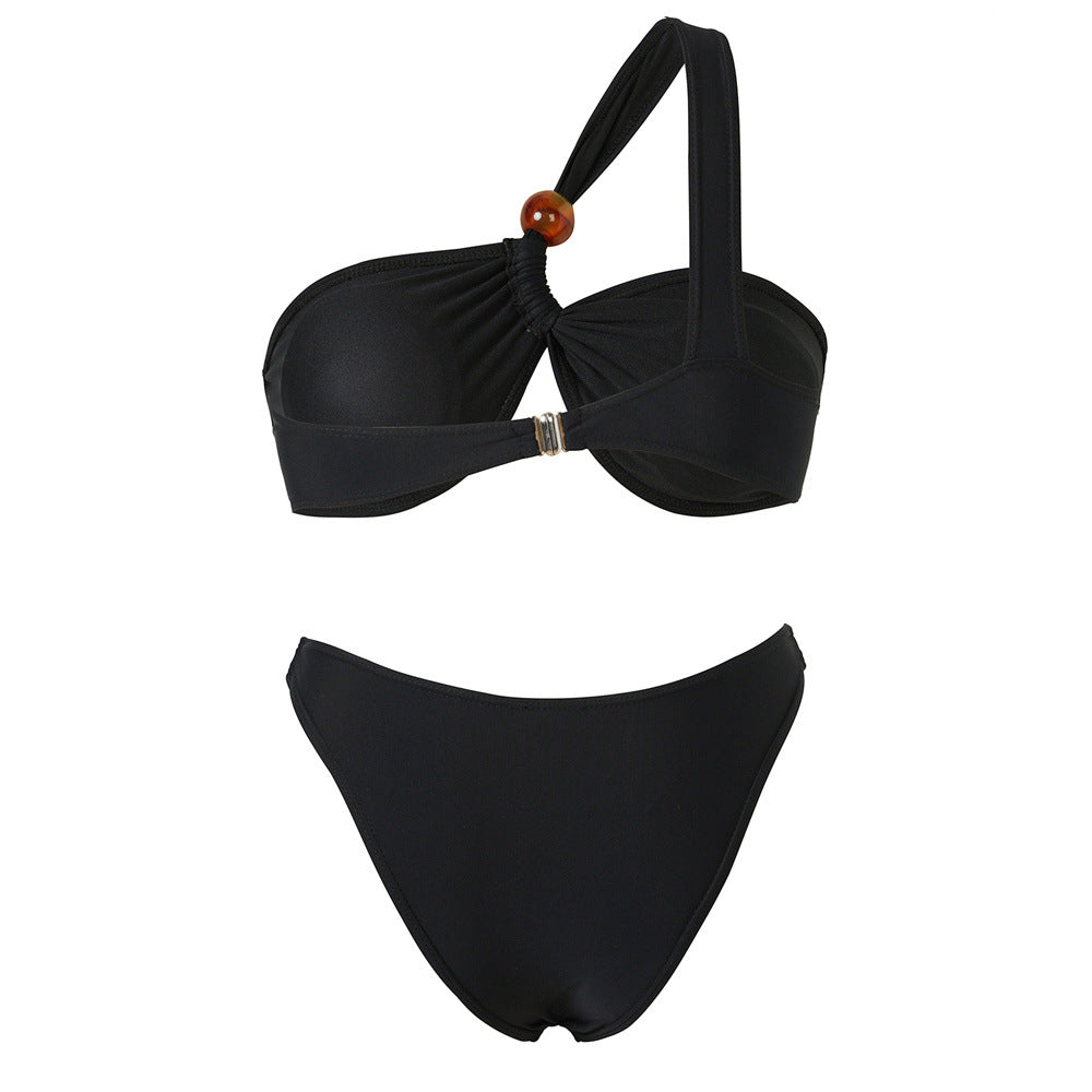 Damen Bikini-Set mit asymmetrischem Halter-Neck und dekorativen Hosenknöpfen Echo Archiv
