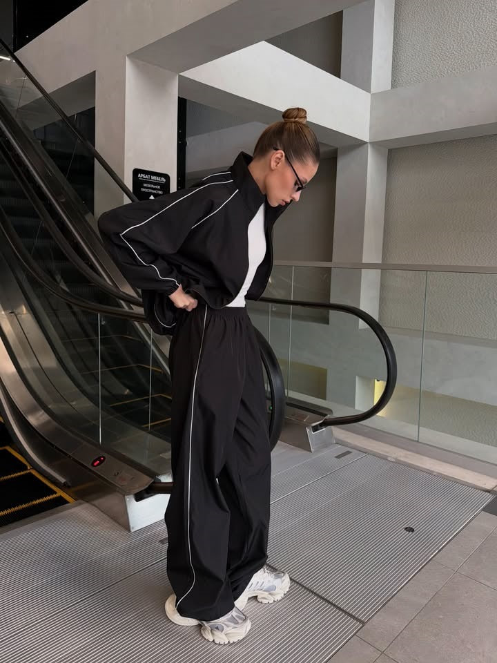 Damen Zweiteiliges Loungewear-Set mit Stehkragen-Zipjacke und weiter Bundfaltenhose – Élanora