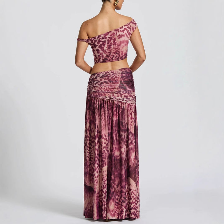 Damen Elegantes Oberteil mit hoch geschnittenem Rock im Tierdruck Echo Archiv