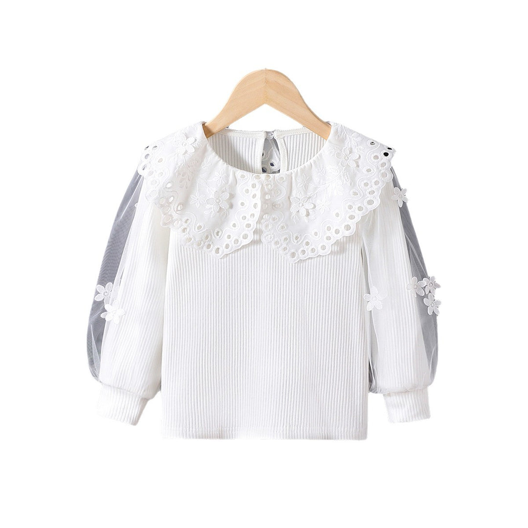 Mädchen Bluse mit voluminösen Tüllärmeln und aufwändigen Blumenstickereien Echo Archiv