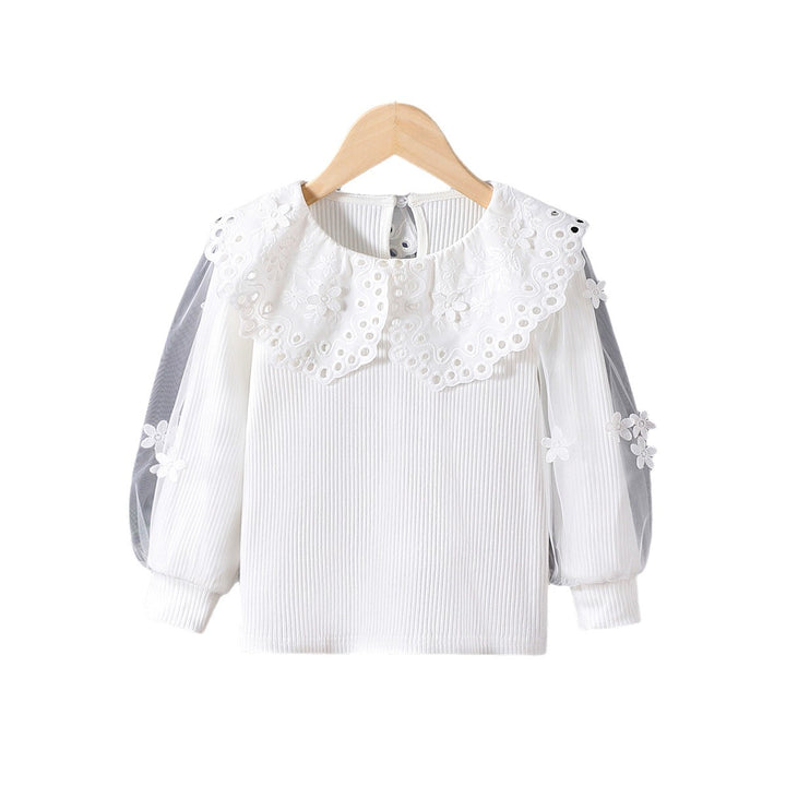 Mädchen Bluse mit voluminösen Tüllärmeln und aufwändigen Blumenstickereien Echo Archiv