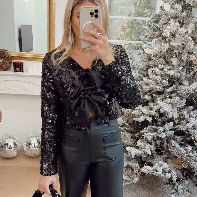 Damen Pailletten-Bolerojacke mit doppelt gebundenen Satin‑Schleifen und kurzer Cropped‑Silhouette – Célinea