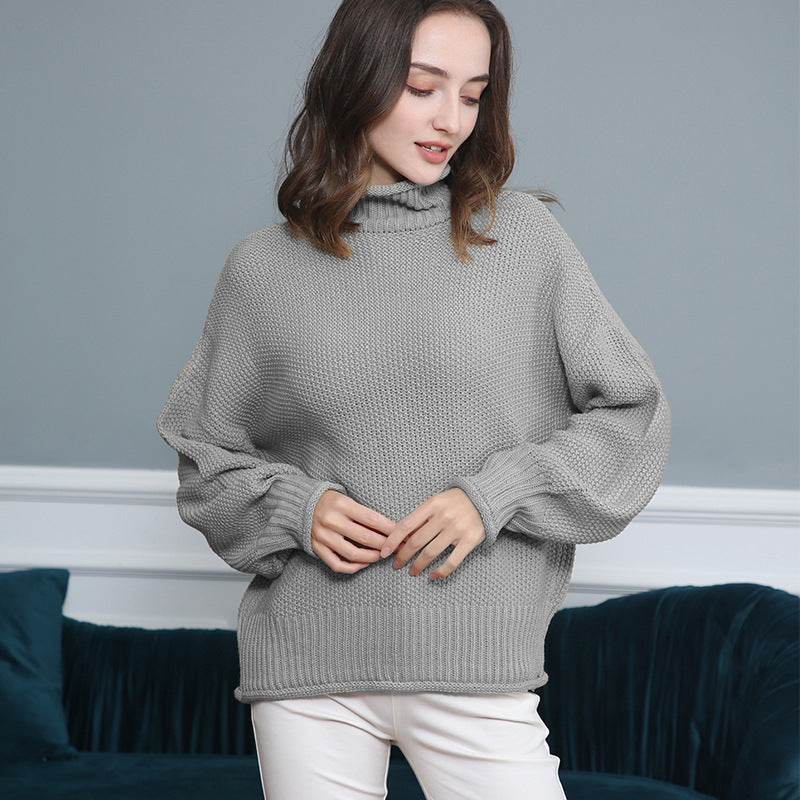 Damen Grobgestrickter Rollkragenpullover mit Ballonärmeln Echo Archiv