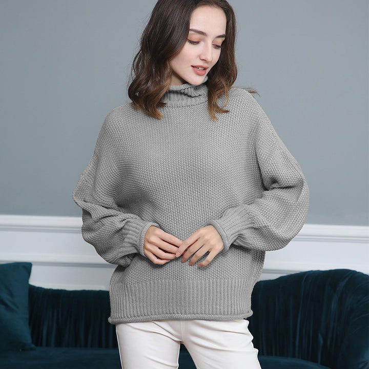 Damen Grobgestrickter Rollkragenpullover mit Ballonärmeln Echo Archiv