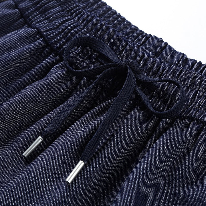 Damen Weite Denim-Cargo-Hose im Baggy-Stil mit Elastbund, Tunnelzug und aufgesetzten Klappentaschen Echoarchiv