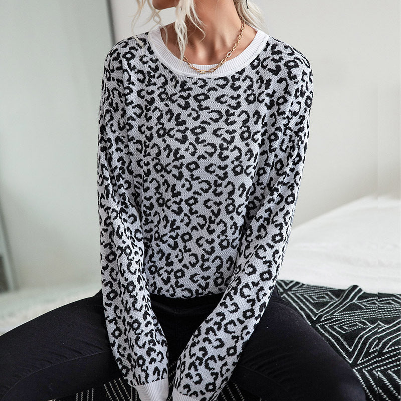 Damen Leichter Strukturstrick-Pullover mit Leoparden-Jacquard und geripptem Rundhalsausschnitt Echoarchiv