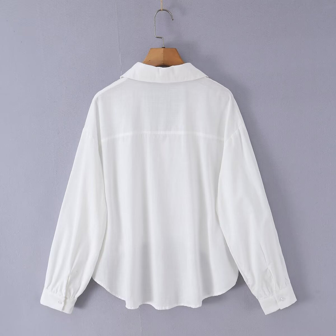 Damen Weite Bluse mit V‑Ausschnitt, Hemdkragen und gerafftem Hoch-Tief-Saum Echo Archiv