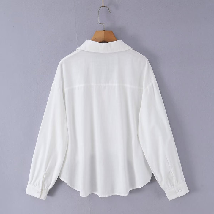 Damen Weite Bluse mit V‑Ausschnitt, Hemdkragen und gerafftem Hoch-Tief-Saum Echo Archiv