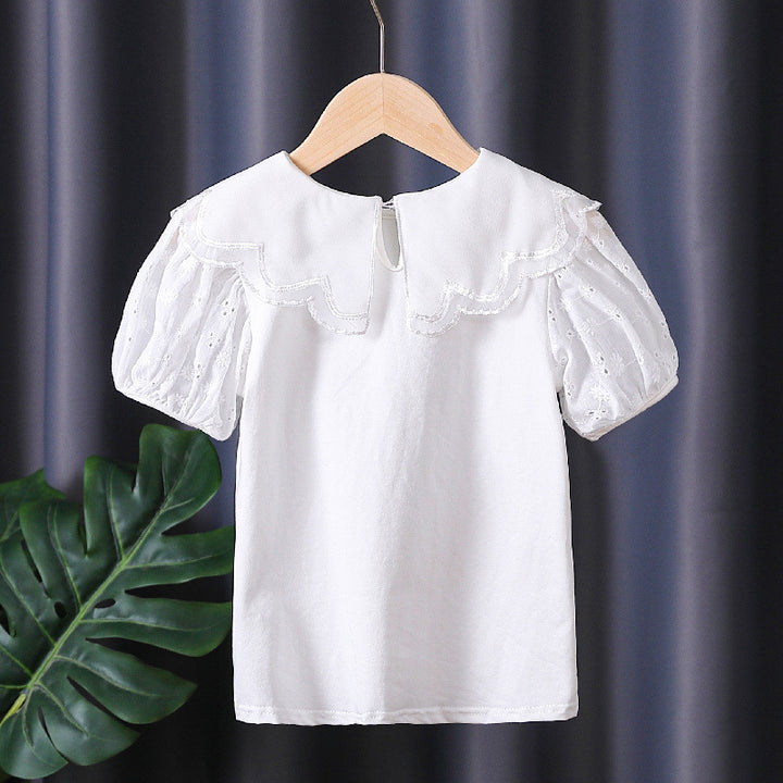 Mädchen Bluse mit dekorativen Lochstickereien und voluminösen Puffärmeln Echo Archiv