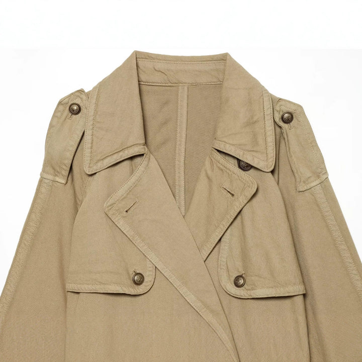 Damen Kurz geschnittene Trenchjacke mit Doppelknopfleiste, Schulterpatten und Taillengürtel Echo Archiv