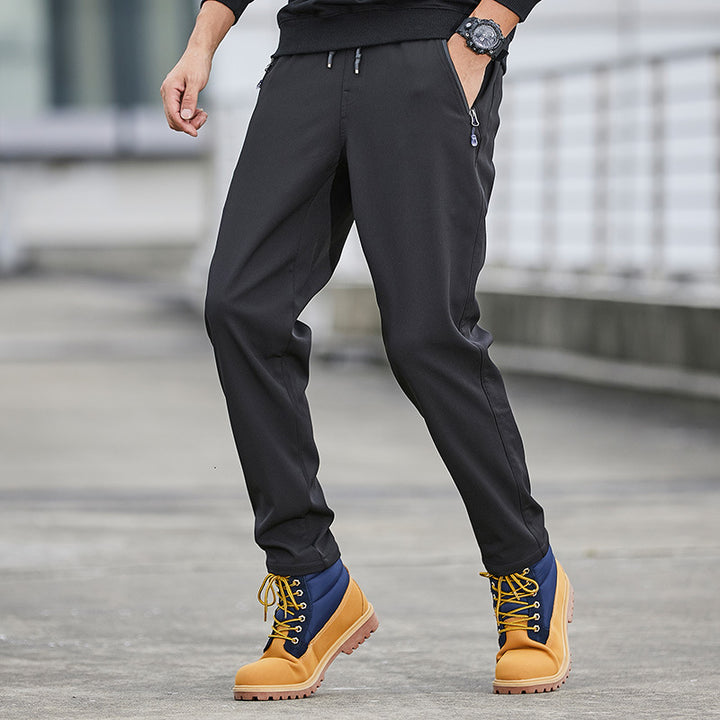 Herren Technische Softshell-Jogginghose mit wasserabweisender Membran, Reißverschlusstaschen und elastischem Kordelbund Echo Archiv