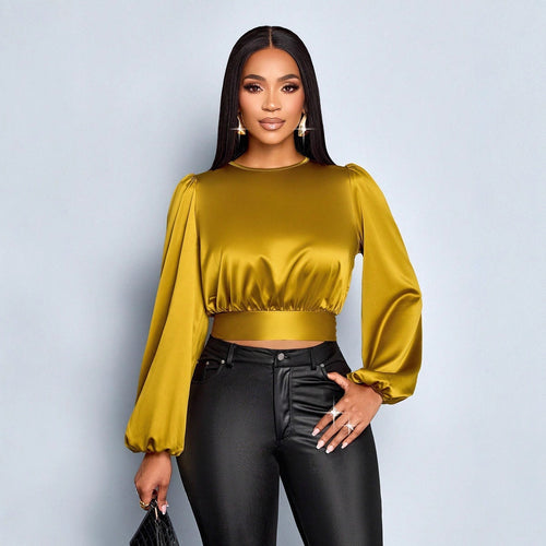Damen Elegant geschnittene Leoparden-Bluse mit Dekolleté und Schleifenrand Echo Archiv
