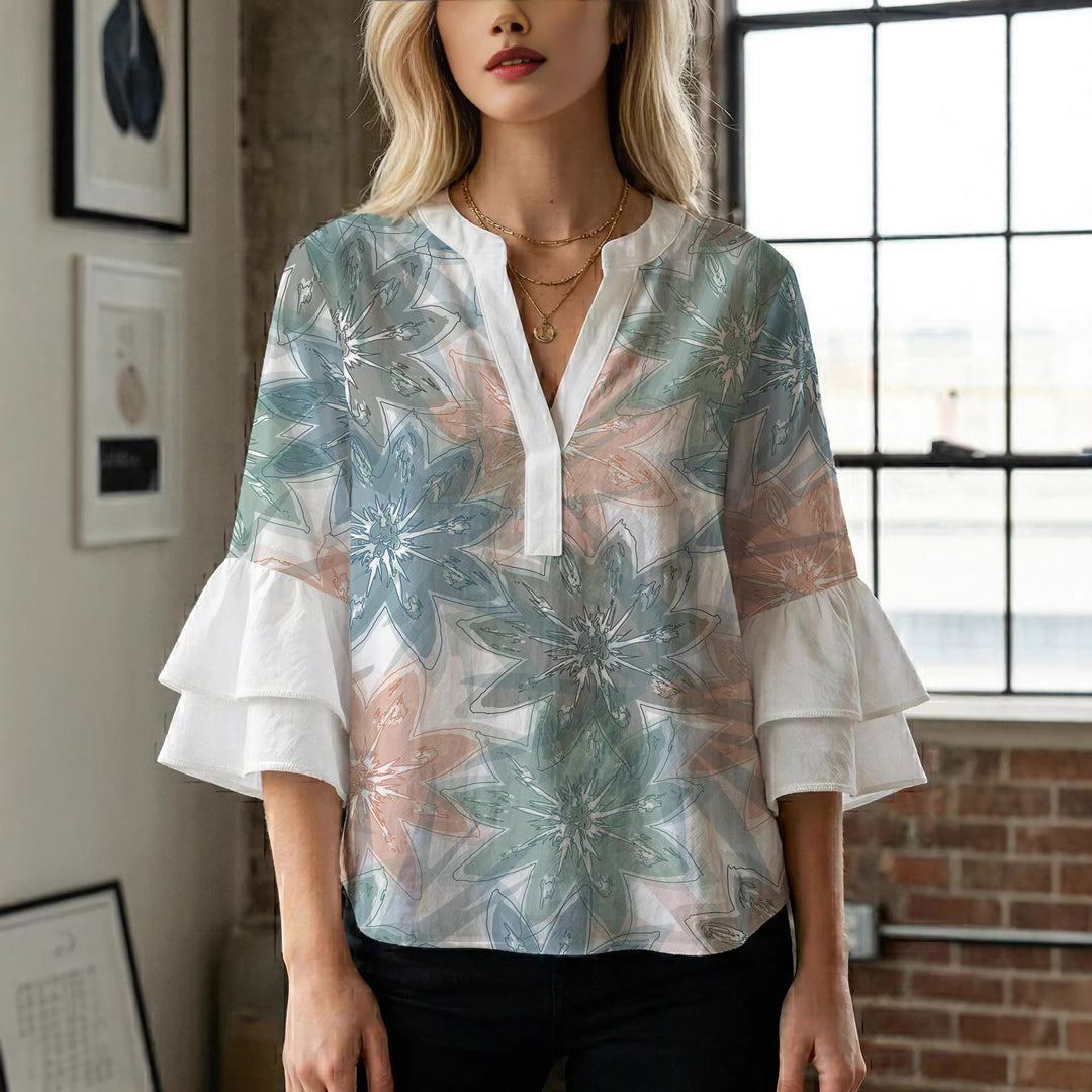 Damen elegantes Oberteil mit voluminösen Rüschensäumen und floralem Design Echo Archiv