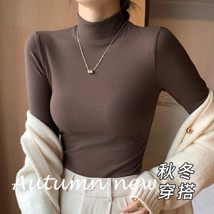 Damen Elegantes und figurbetontes Langarm-Rollkragenoberteil Echo Archiv