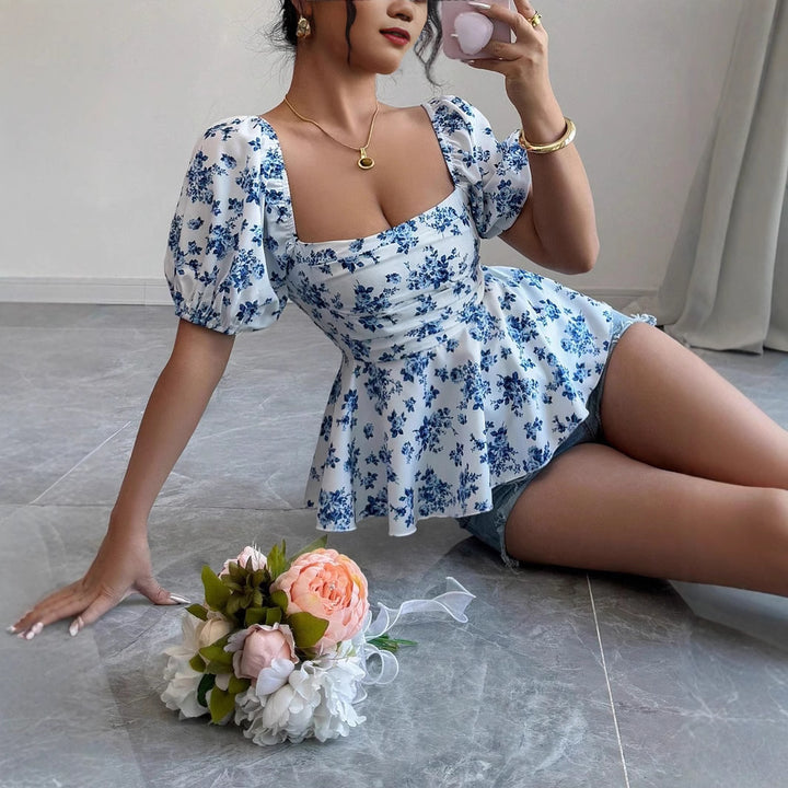 Damen Raffiniertes Oberteil mit Puffärmeln und floralem Design Echo Archiv