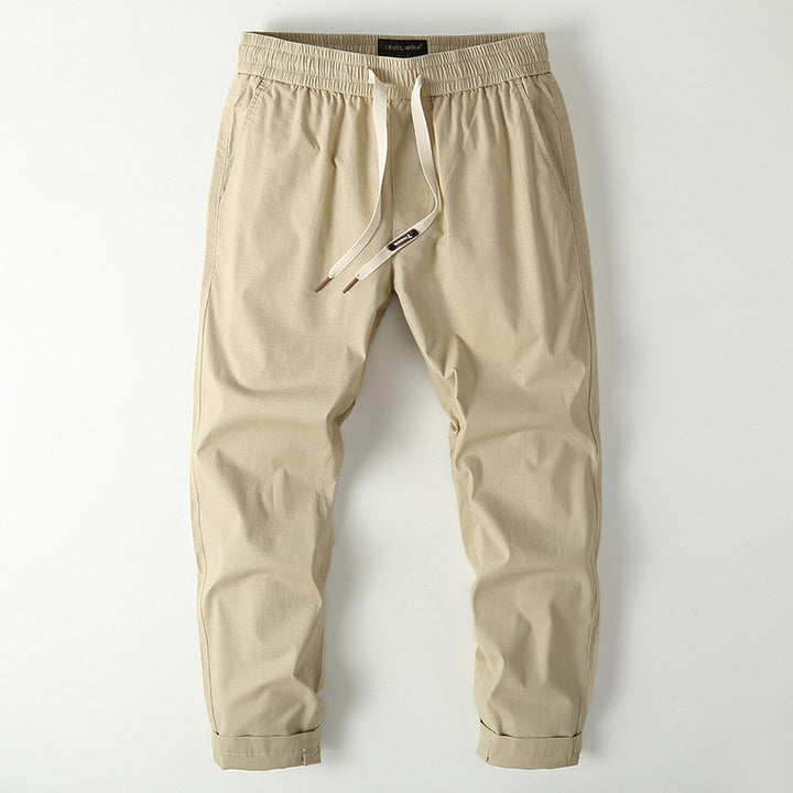 Herren Elastische Chino-Jogger mit tailliertem Tapered-Schnitt und aufgesetzter Gesäßtasche Echoarchiv