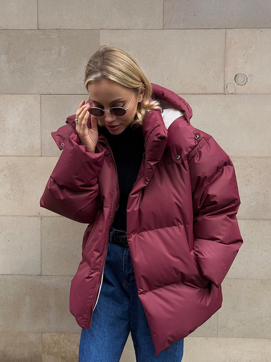 Damen Oversize Steppjacke mit Kapuze und wattierter Thermofüllung Echoarchiv