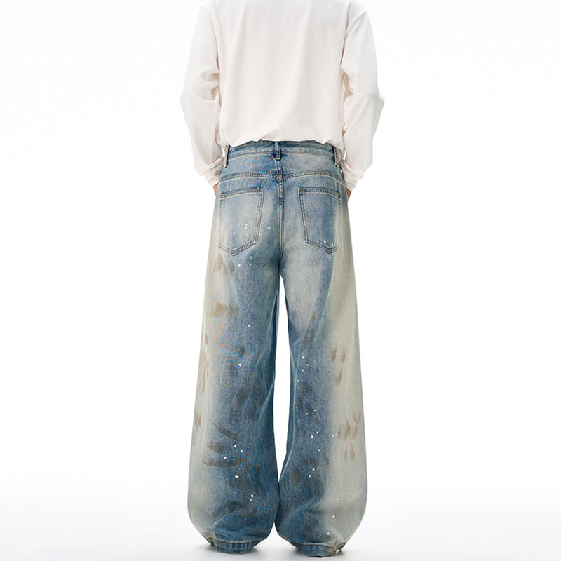 Herren Oversize-Baggy-Denim-Jeans mit künstlerischem Farb-Splatter und weitem Saum Echo Archiv