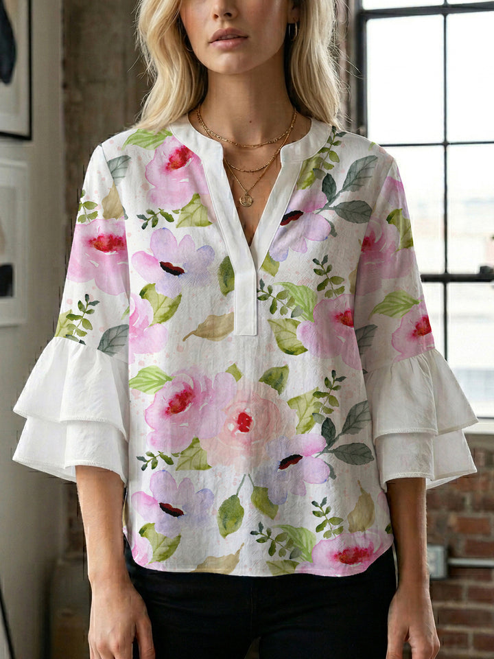 Damen elegantes Blusenshirt mit voluminösen Rüsenärmeln und grafischem Blumendesign Echo Archiv