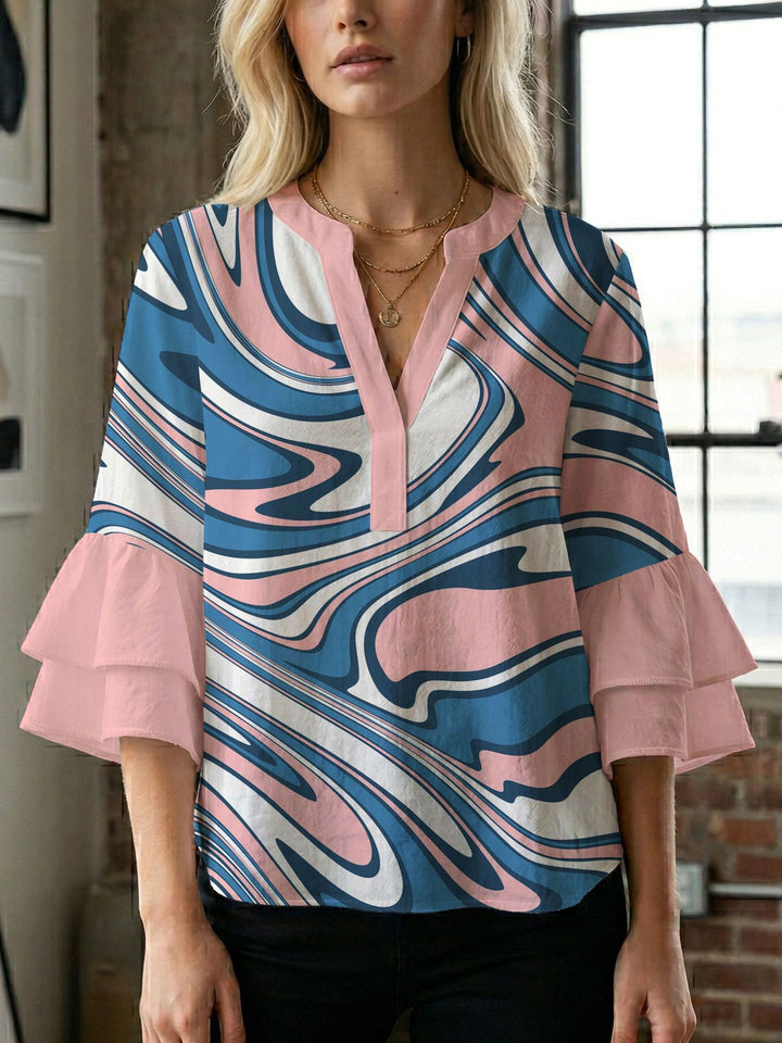 Damen Blusenshirt mit voluminösen Ärmeln und kreativem Druckdesign Echo Archiv