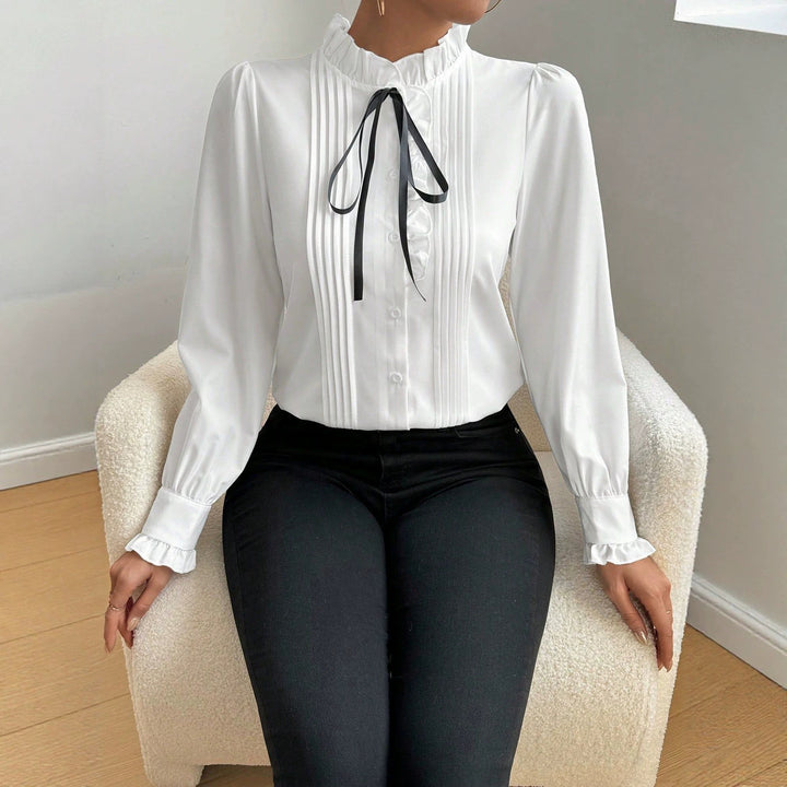 Damen Elegante Bluse mit Rüschen und Schleifen-Detail Echo Archiv
